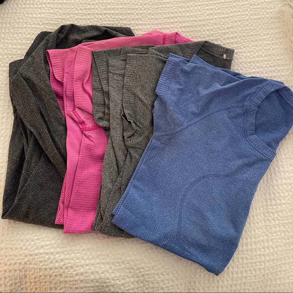Lot of 4 lululemon swiftly tech t shirts. 3 short sleeve and 1 long sleeve.